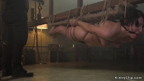 Bound slave suffers suspension and fuck